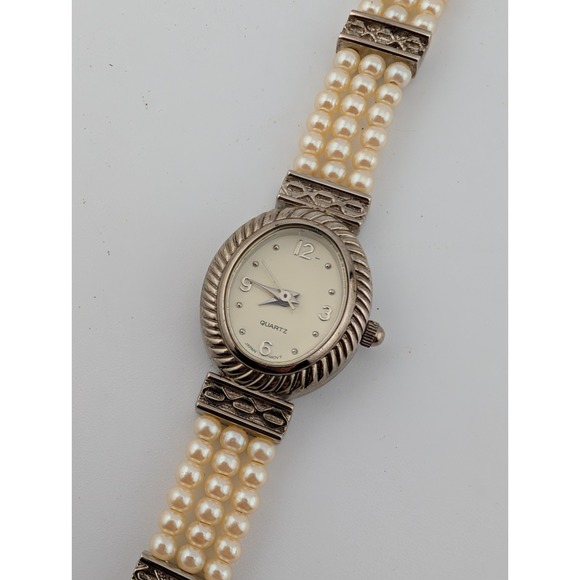 Avon Accessories - Vintage Avon Faux Pearl Band Watch Women 18mm Silver Tone Oval- New Battery